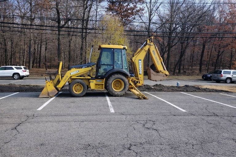 GradeCraft backhoe loader site work Warren County NJ
