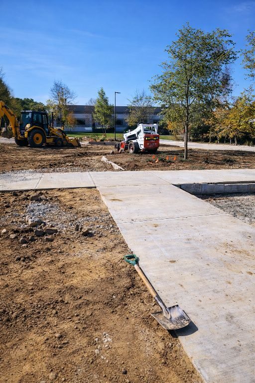 GradeCraft driveway prep and concrete site work with backhoe and skid steer — Warren County NJ